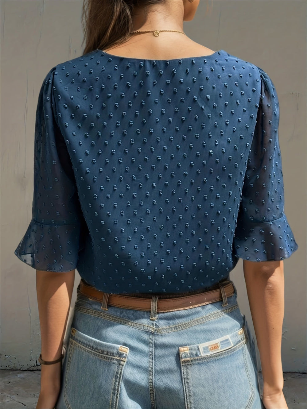 Lös blus med låg ärm