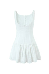 Sleeveless mini dress with buttons and lace