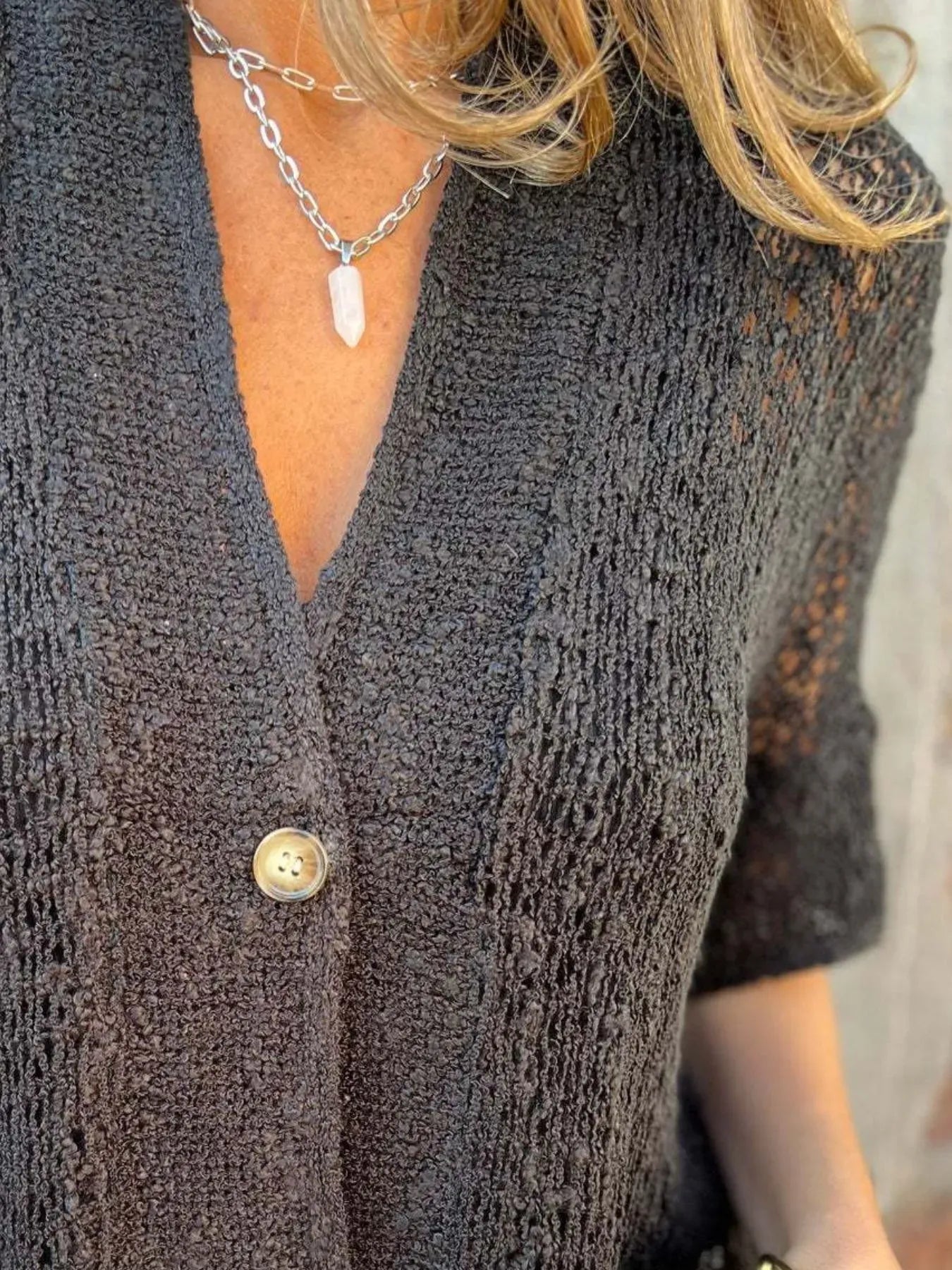 Open-knit cardigan with short sleeves and button