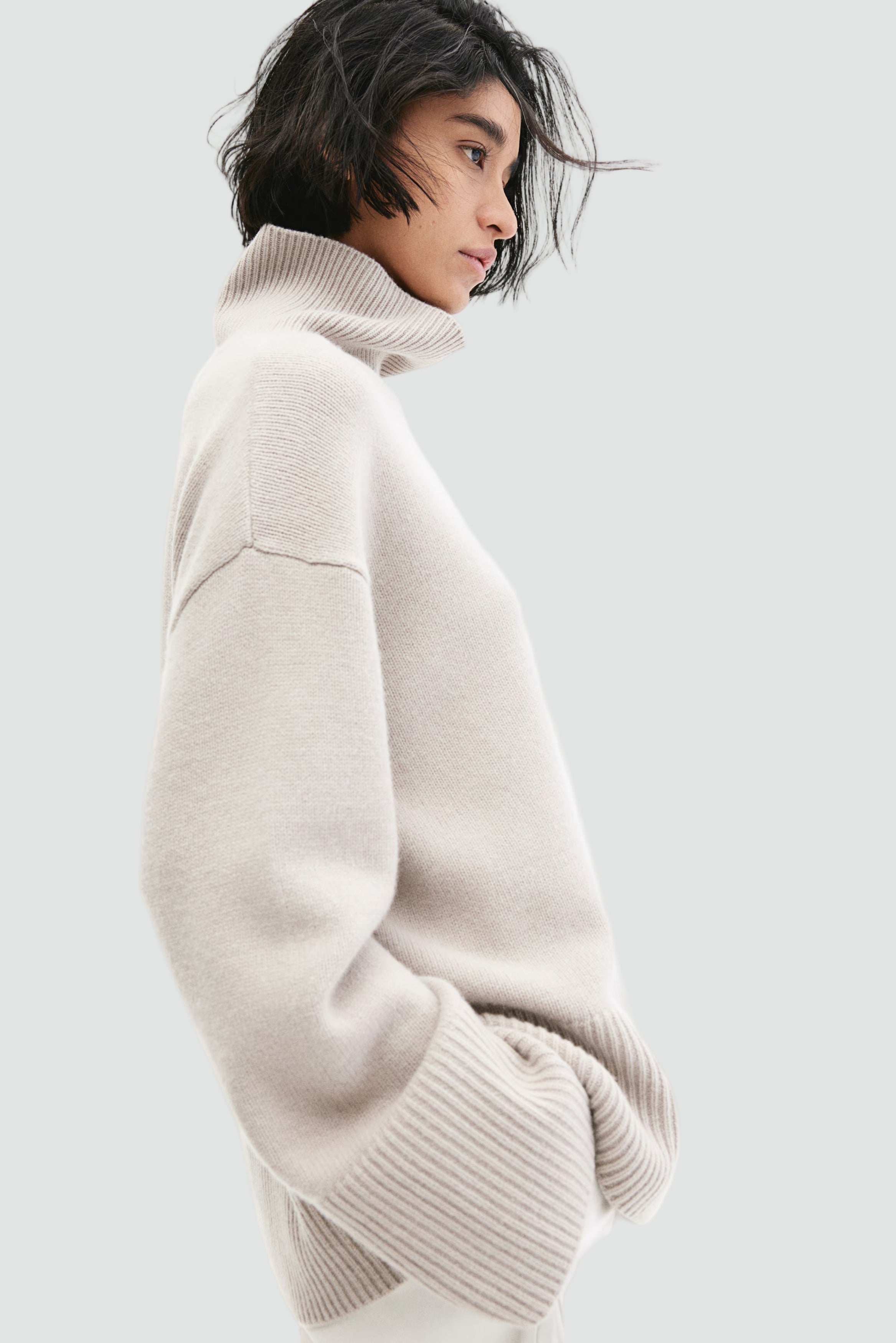 High neck ticked sweater with wide sleeves