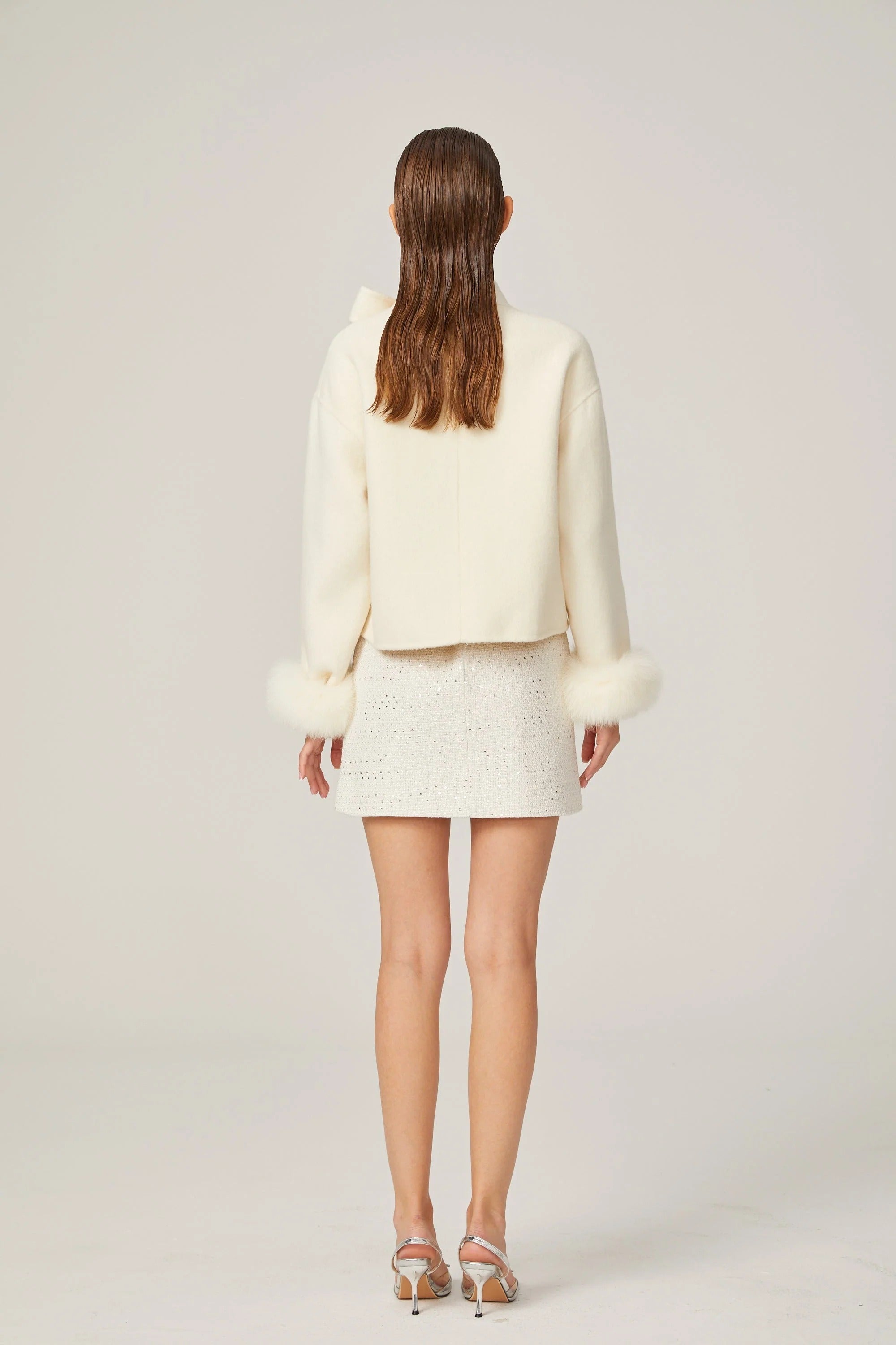 Cream short jacket with bow collar and fluffy cuffs