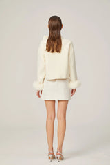 Cream short jacket with bow collar and fluffy cuffs