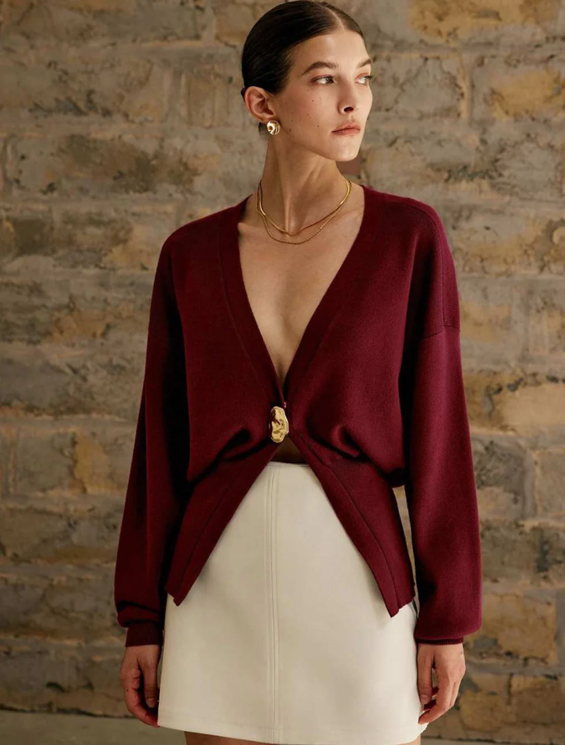 Cardigan with sculpted button and v-neck