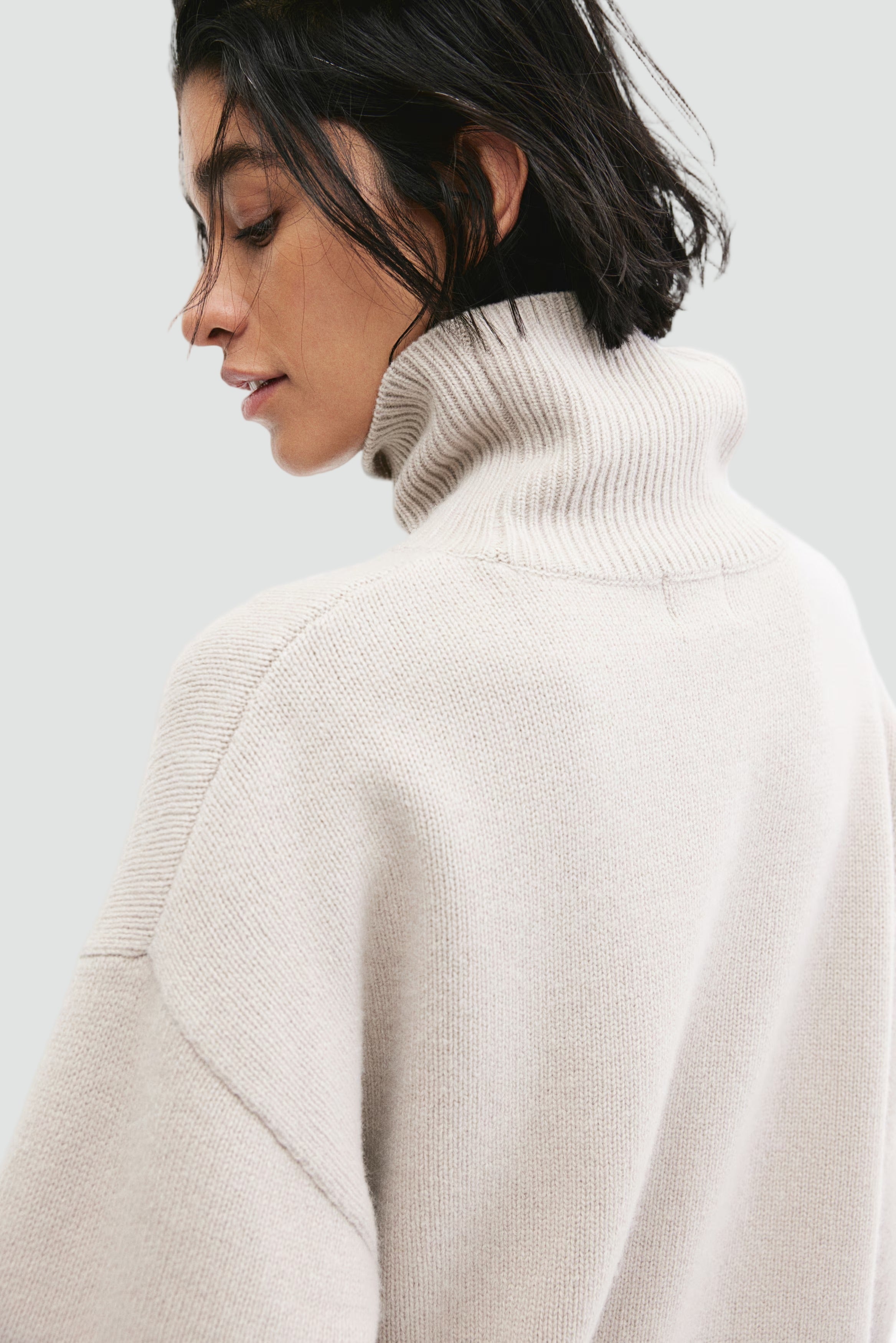 High neck ticked sweater with wide sleeves