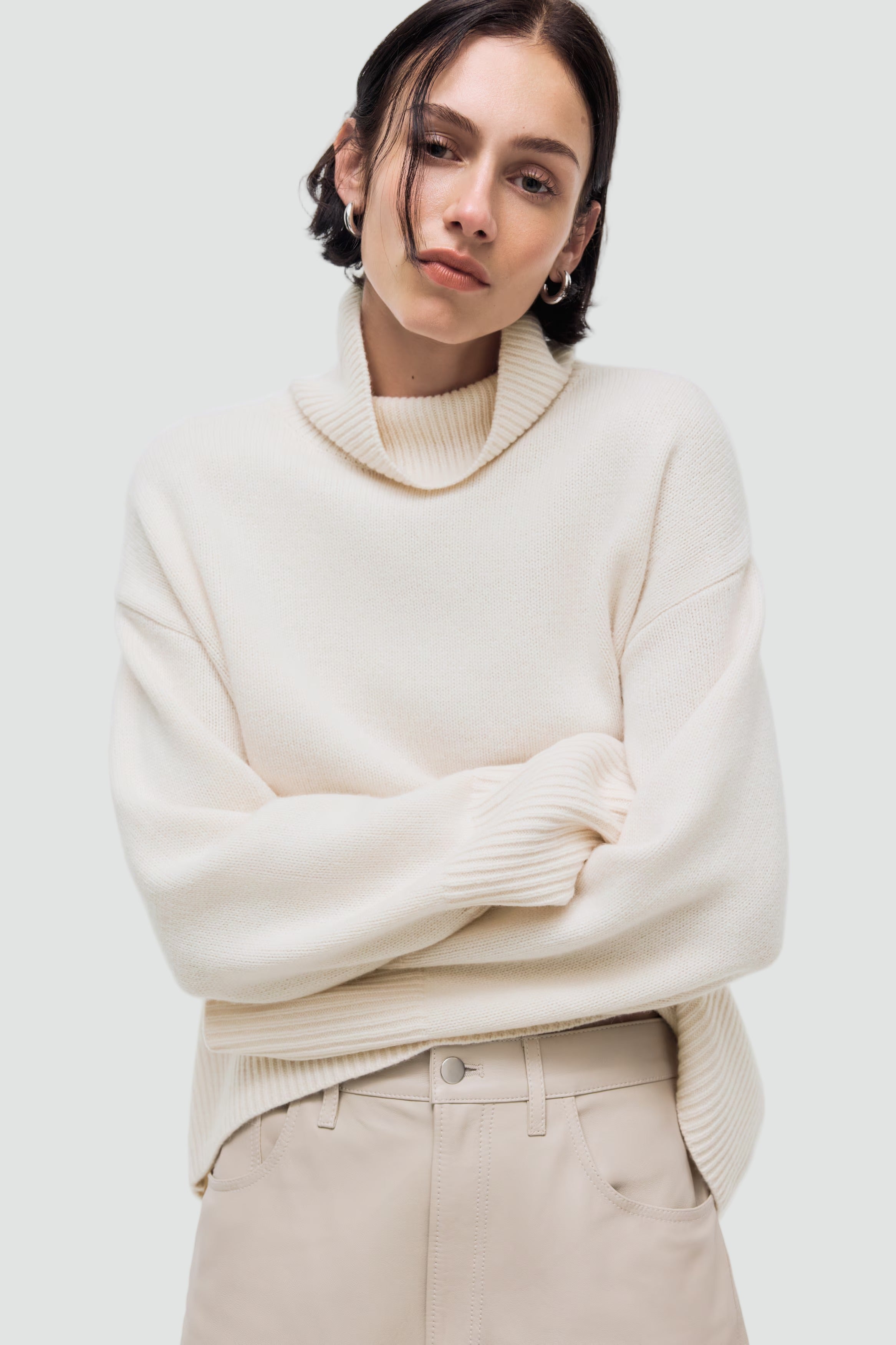 High neck ticked sweater with wide sleeves