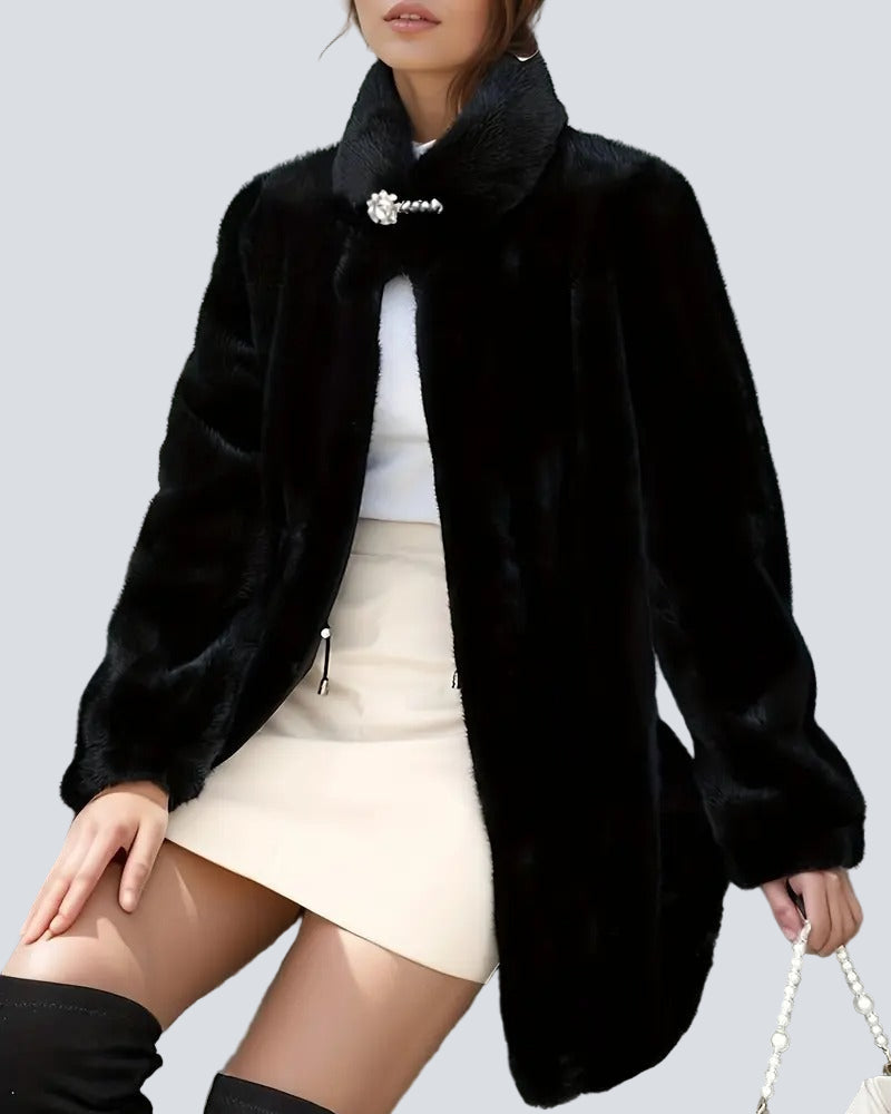 Black coat with high collar and jeweled button