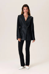 Asymmetrical single-breasted blazer with a defined waist