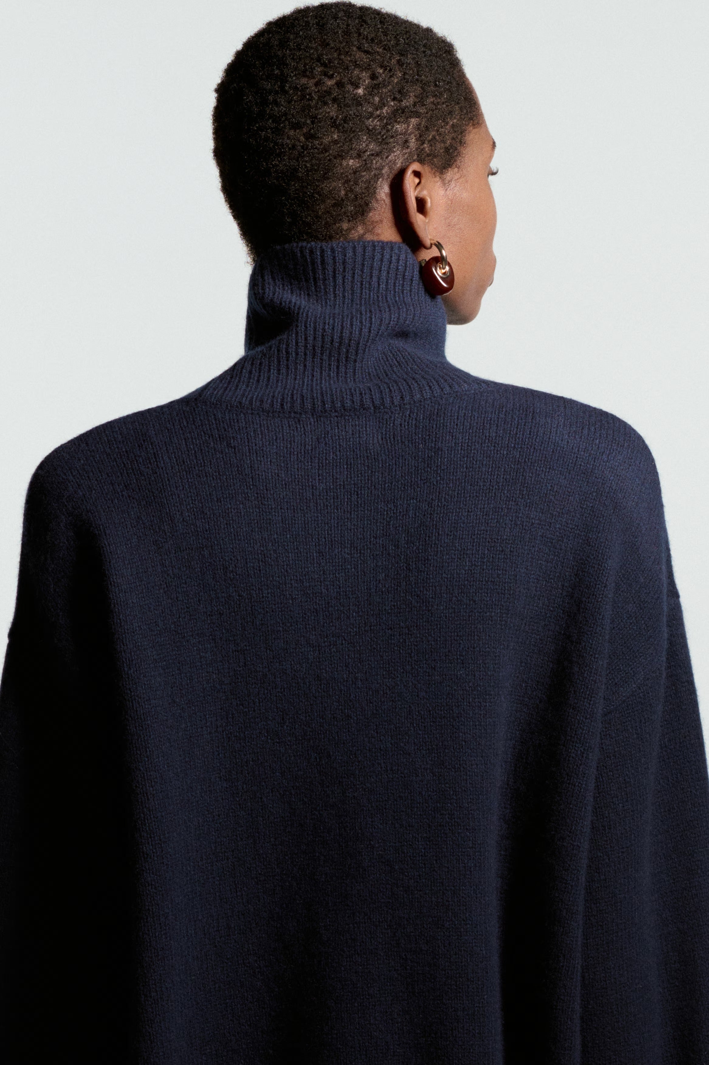 High neck ticked sweater with wide sleeves