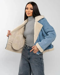 Light blue denim jacket with asymmetric zipper and cream trim