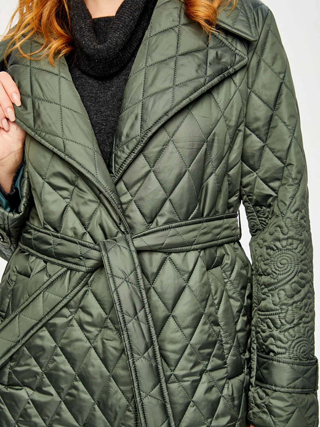 Quilted long coat with floral details