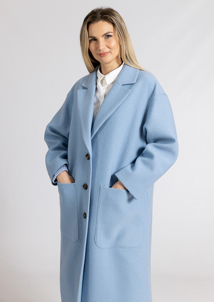 Light blue long coat with outside pockets