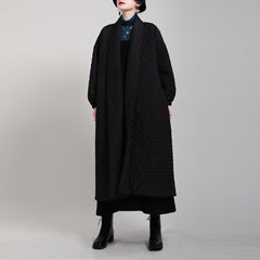 Black quilted wrap coat with belt