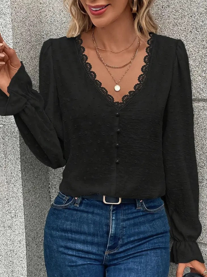 Blouse with lace trim and puff sleeves