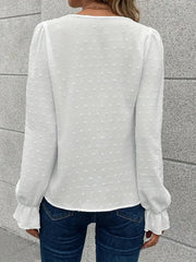 Blouse with lace trim and puff sleeves