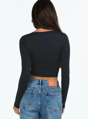 Black long-sleeved crop top with sweetheart neckline