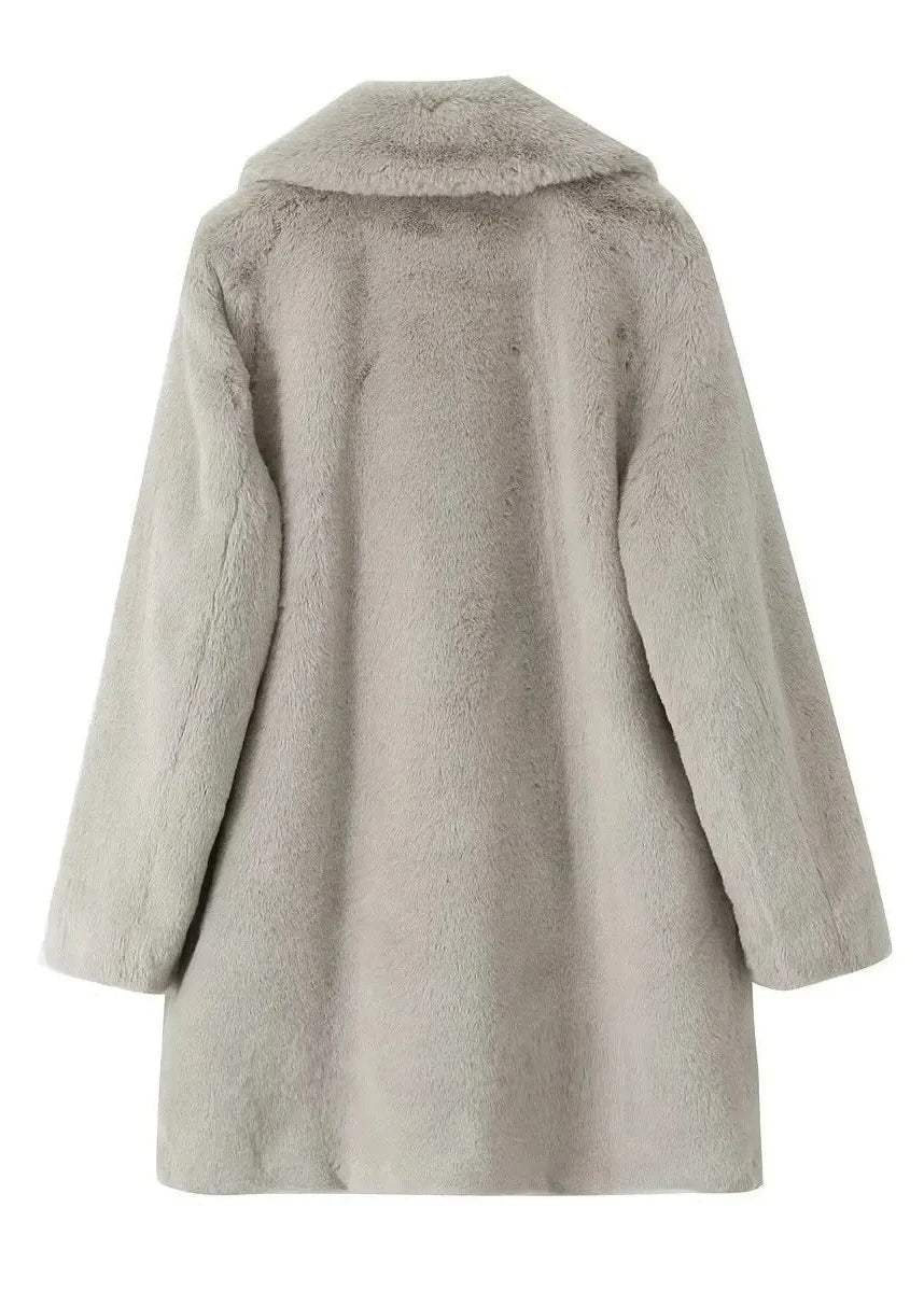 Teddy coat with lapels and a loose fit