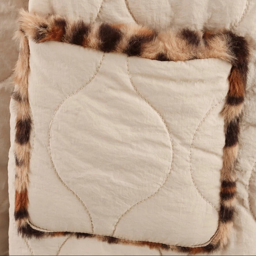 Cream double-sided quilted jacket with leopard details