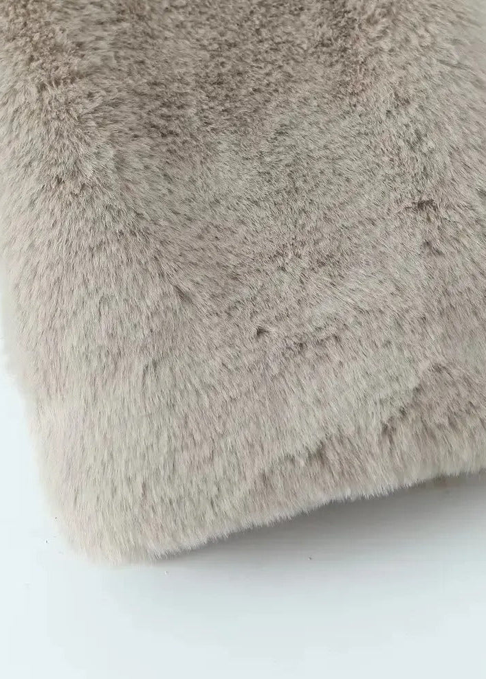 Teddy coat with lapels and a loose fit