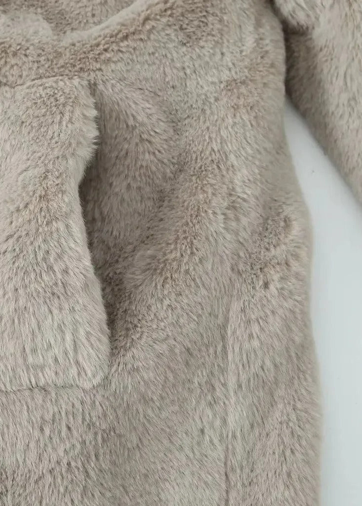 Teddy coat with lapels and a loose fit