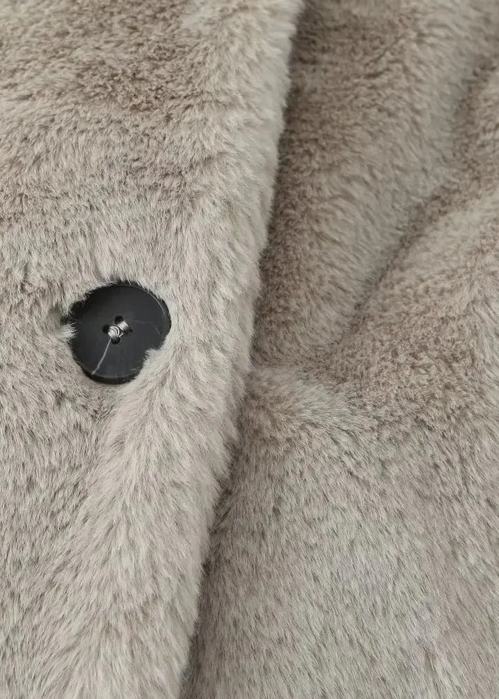 Teddy coat with lapels and a loose fit