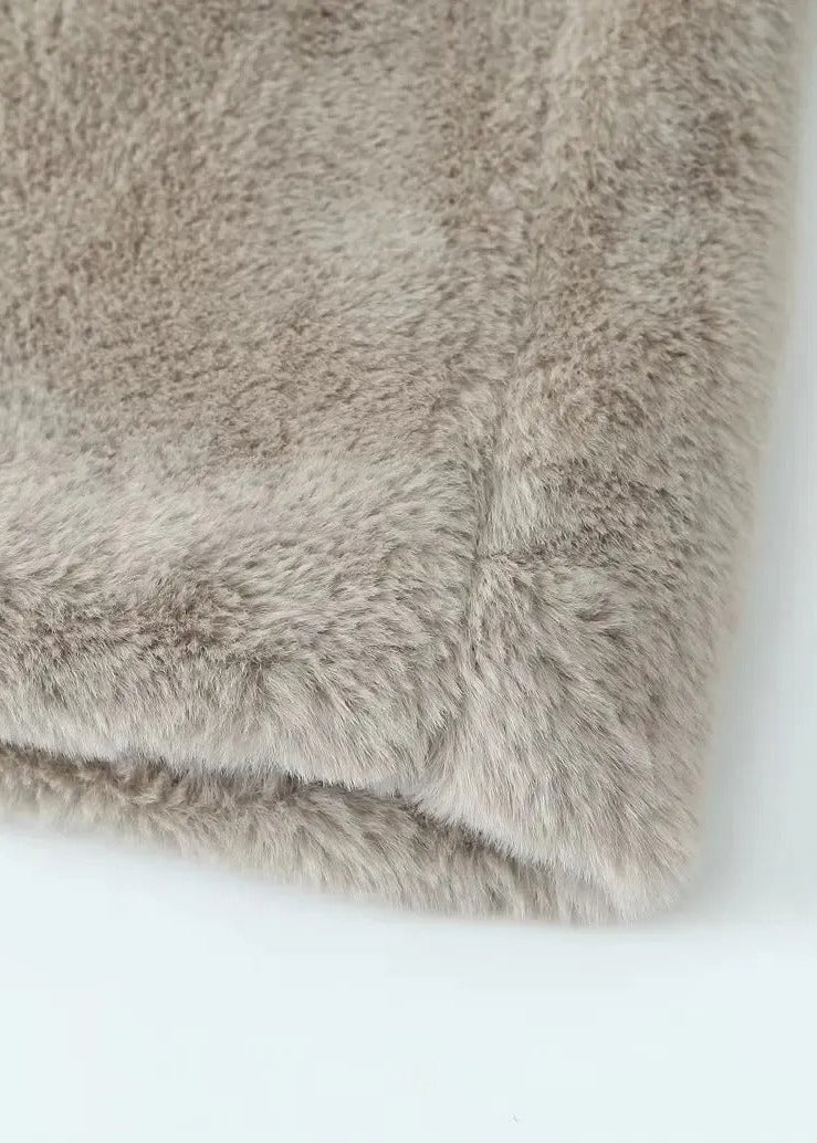 Teddy coat with lapels and a loose fit