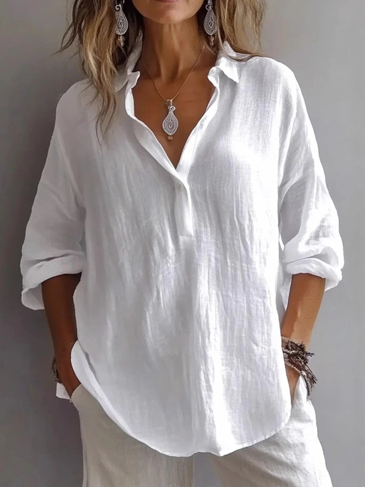 Long shirt with a relaxed fit and rolled up sleeves