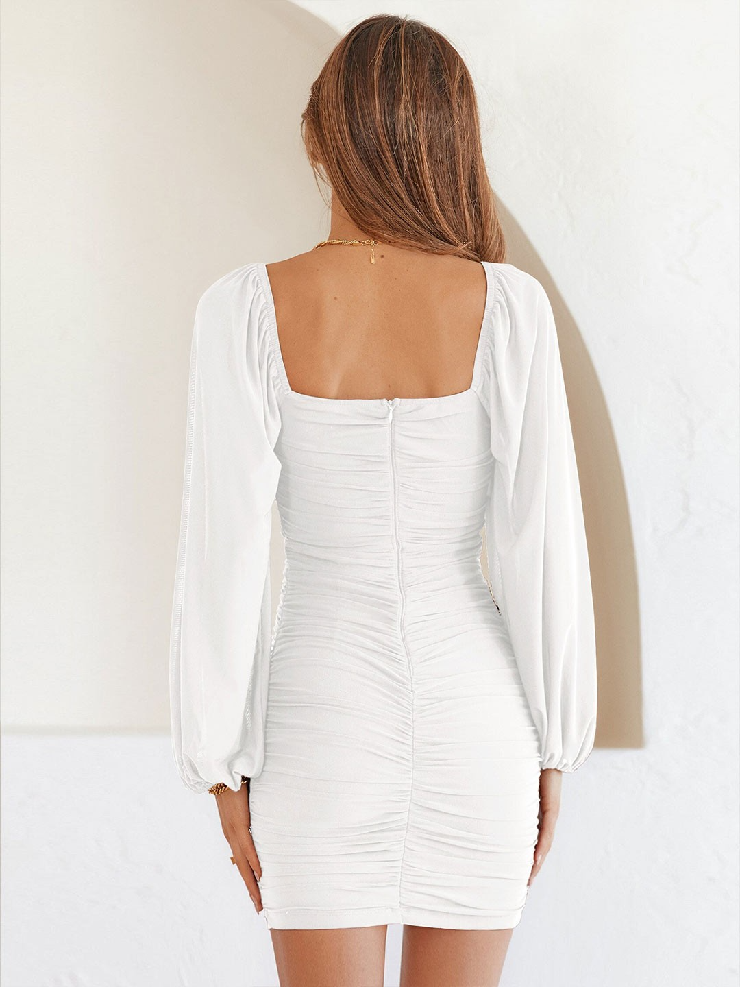 Ruffled mini dress with long puff sleeves