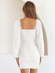 Ruffled mini dress with long puff sleeves