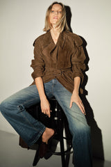 Brown trench coat with belt and shoulder details