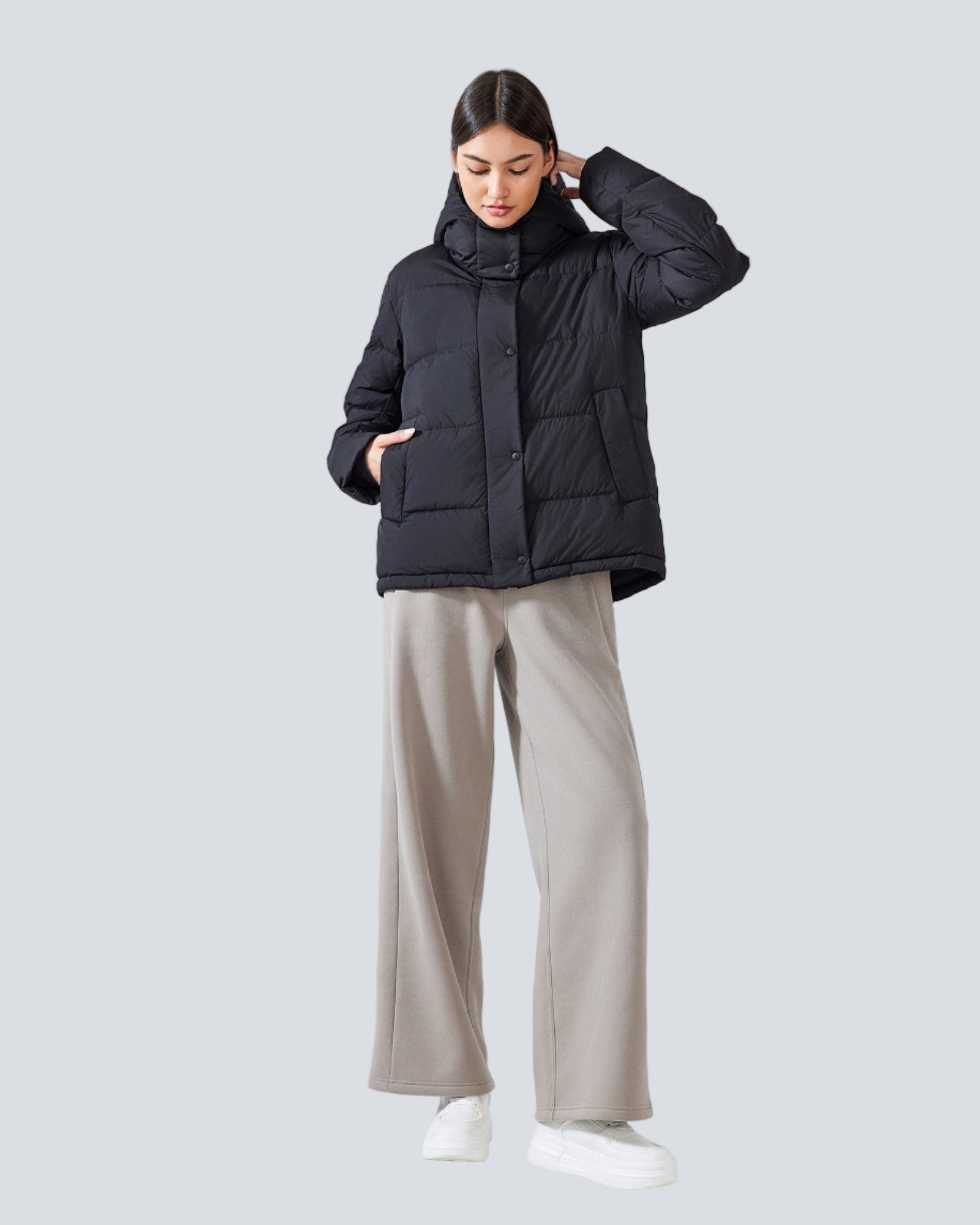 Short padded jacket with hood and high collar