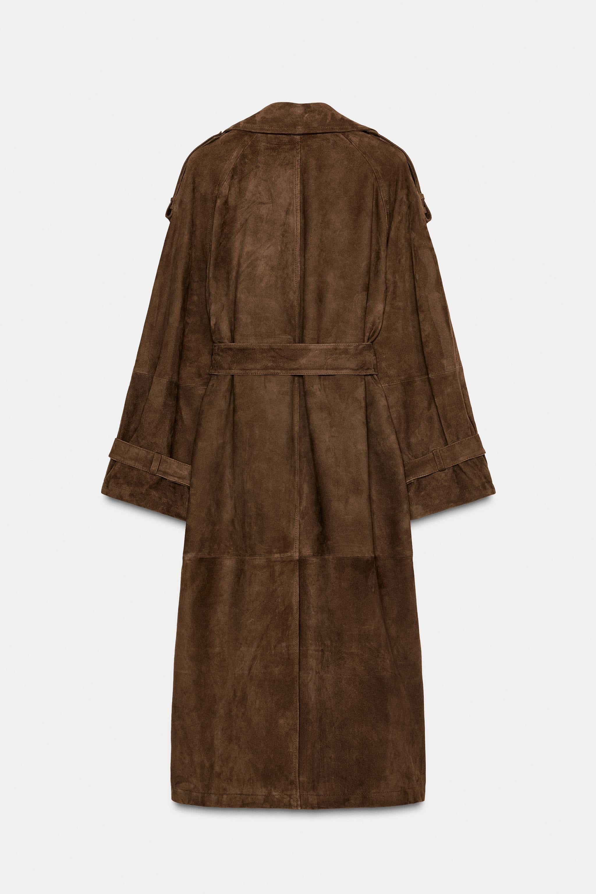 Brown trench coat with belt and shoulder details