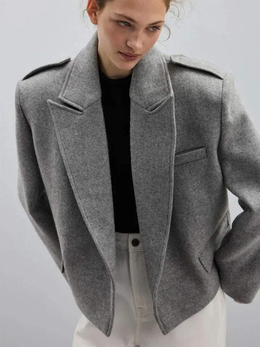 Gray short blazer with wide lapels and epaulettes