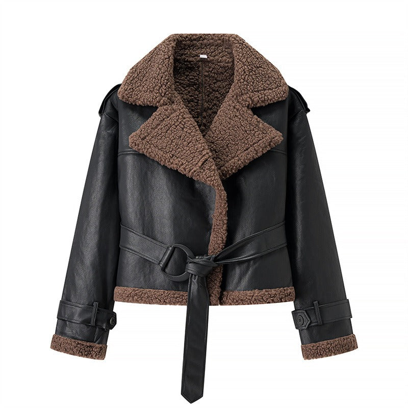 Black winter jacket with fluffy brown collar and belt
