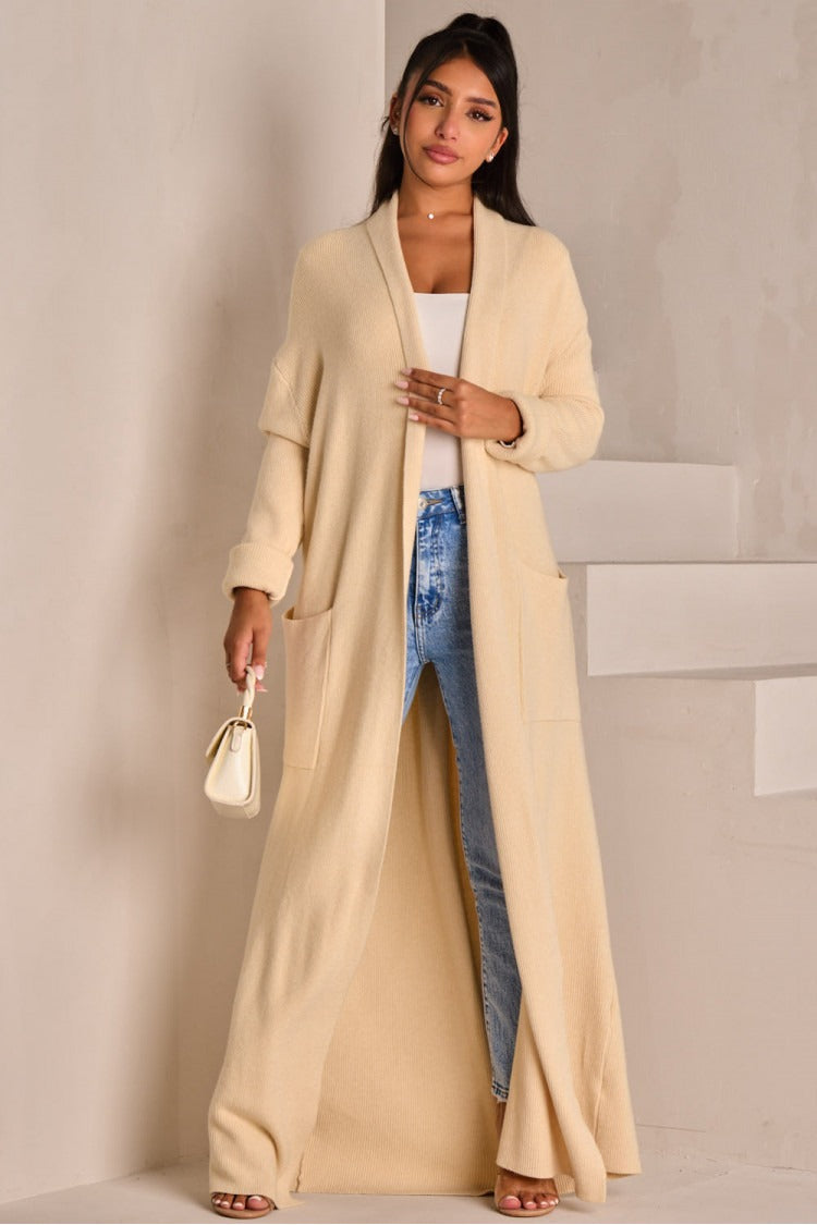 Beige long cardigan with tie belt and shawl collar