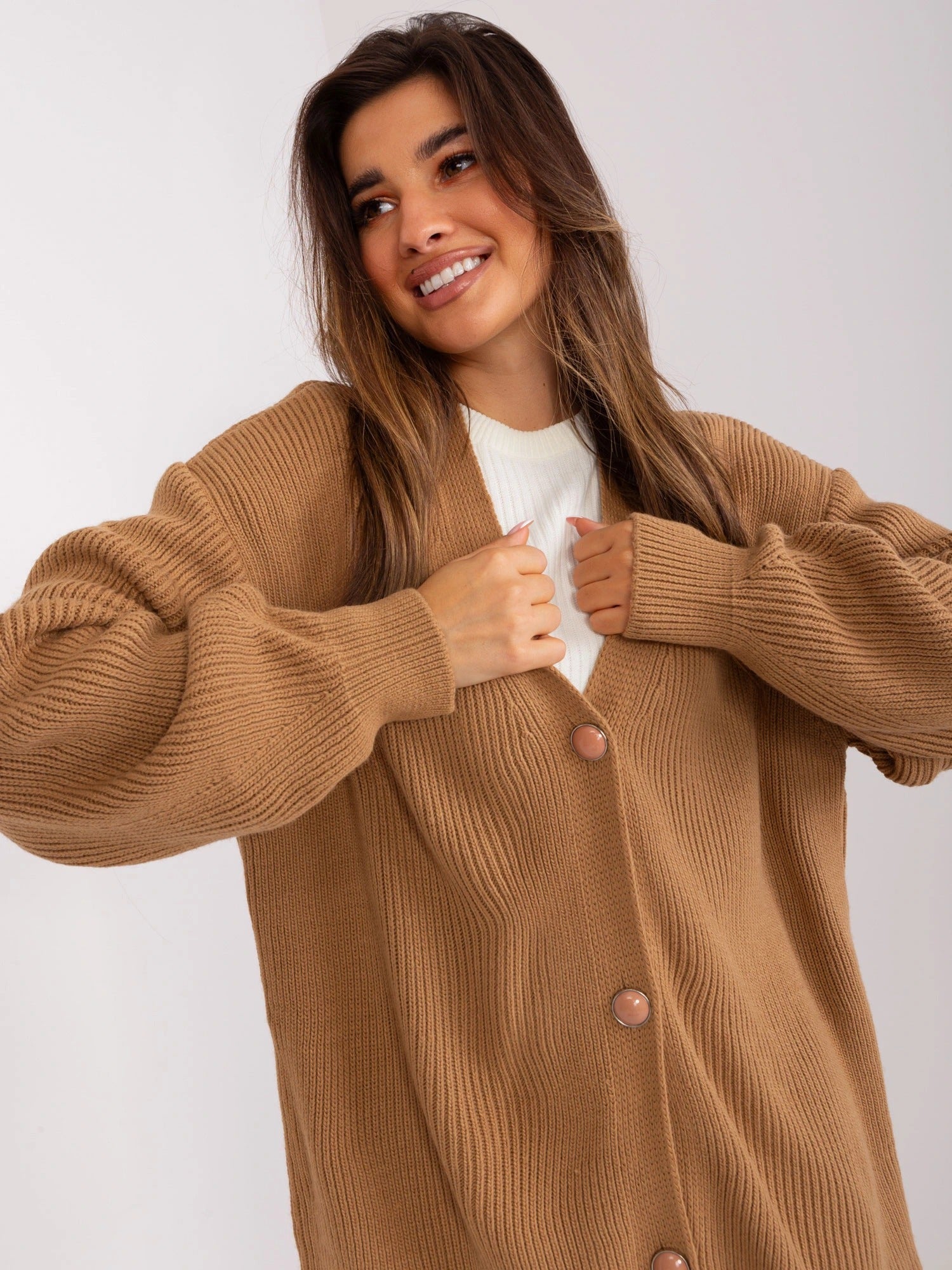 Brown oversized cardigan with buttons at the front