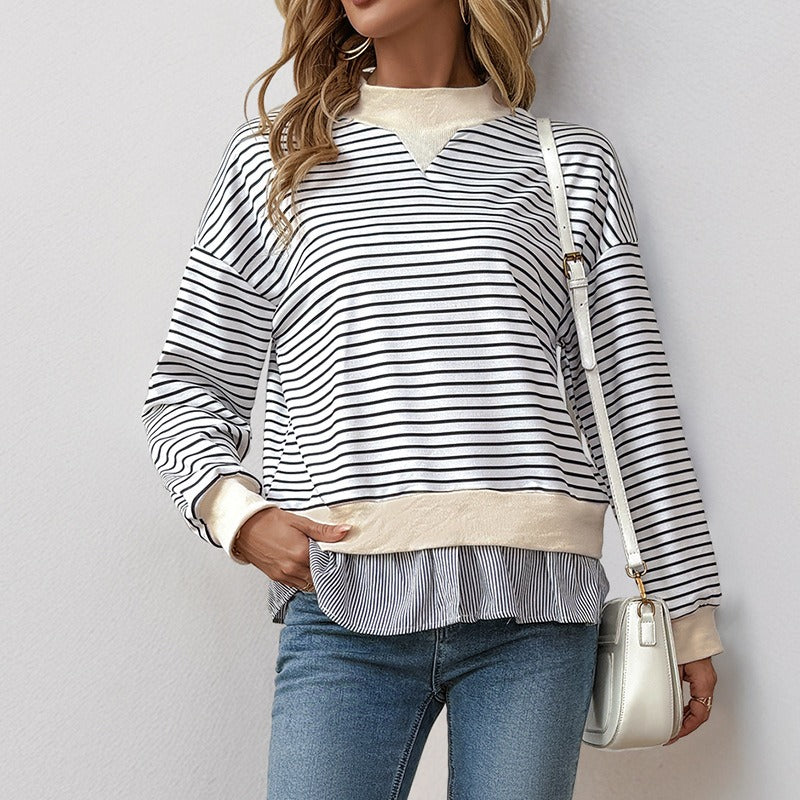 Black and white striped sweatshirt with beige details
