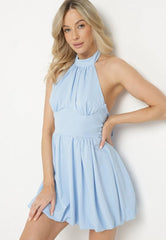 Backless mini dress with pleated skirt