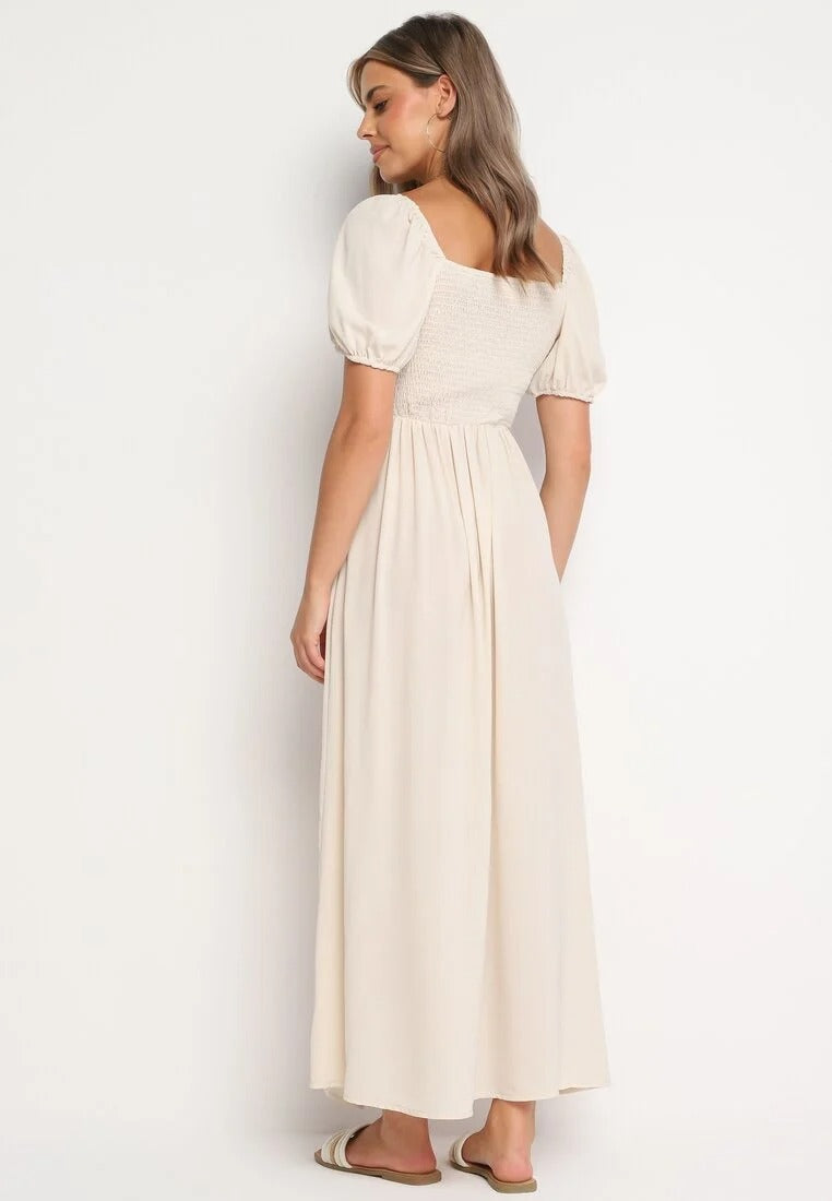 Long dress with puffed sleeves