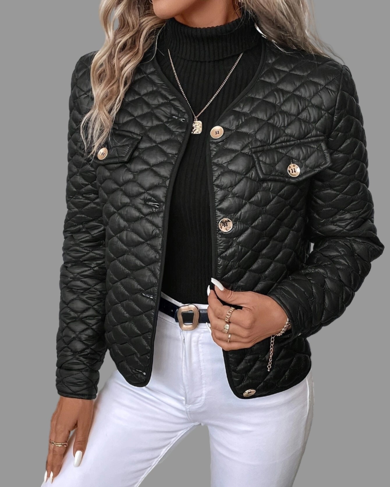Black quilted collarless jacket