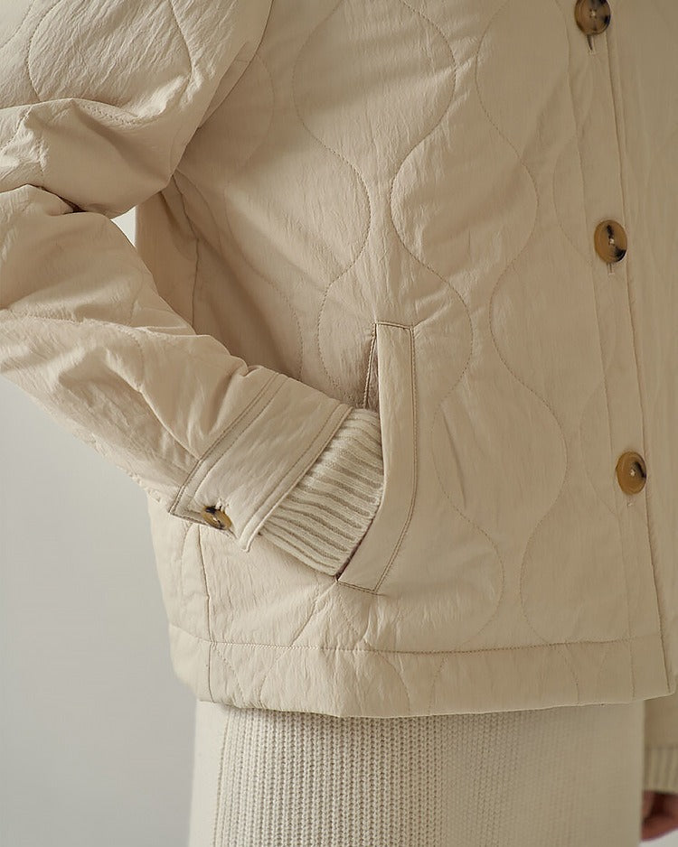 Quilted V-neck jacket with button closure