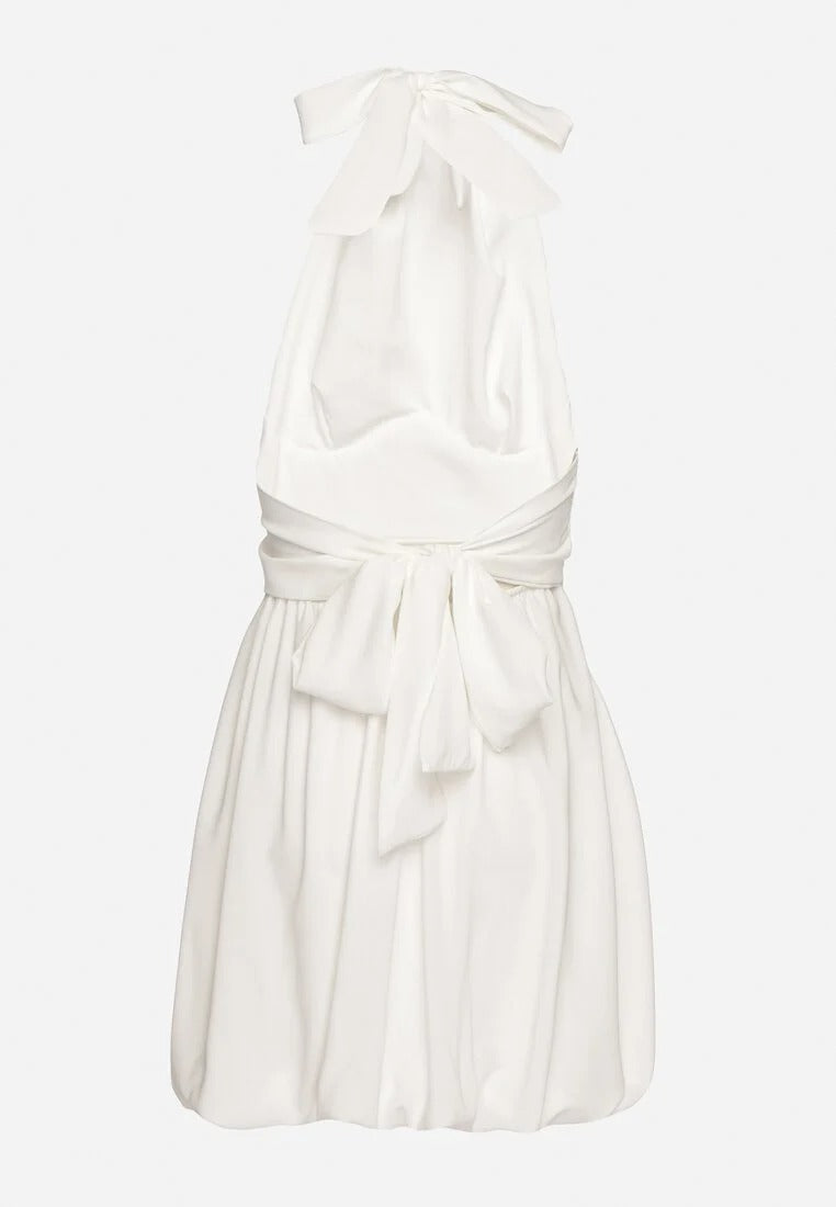 Backless mini dress with pleated skirt