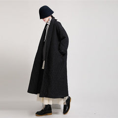 Black quilted wrap coat with belt