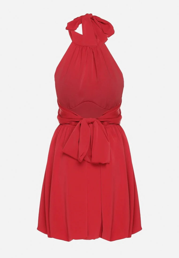 Backless mini dress with pleated skirt