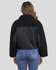 Puffer jacket with high collar and textured sleeves - drawstring at hem