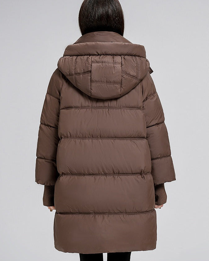 Long padded jacket with hood and pockets
