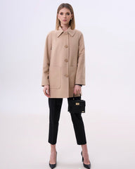 Beige coat with round collar and large pockets