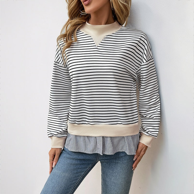Black and white striped sweatshirt with beige details