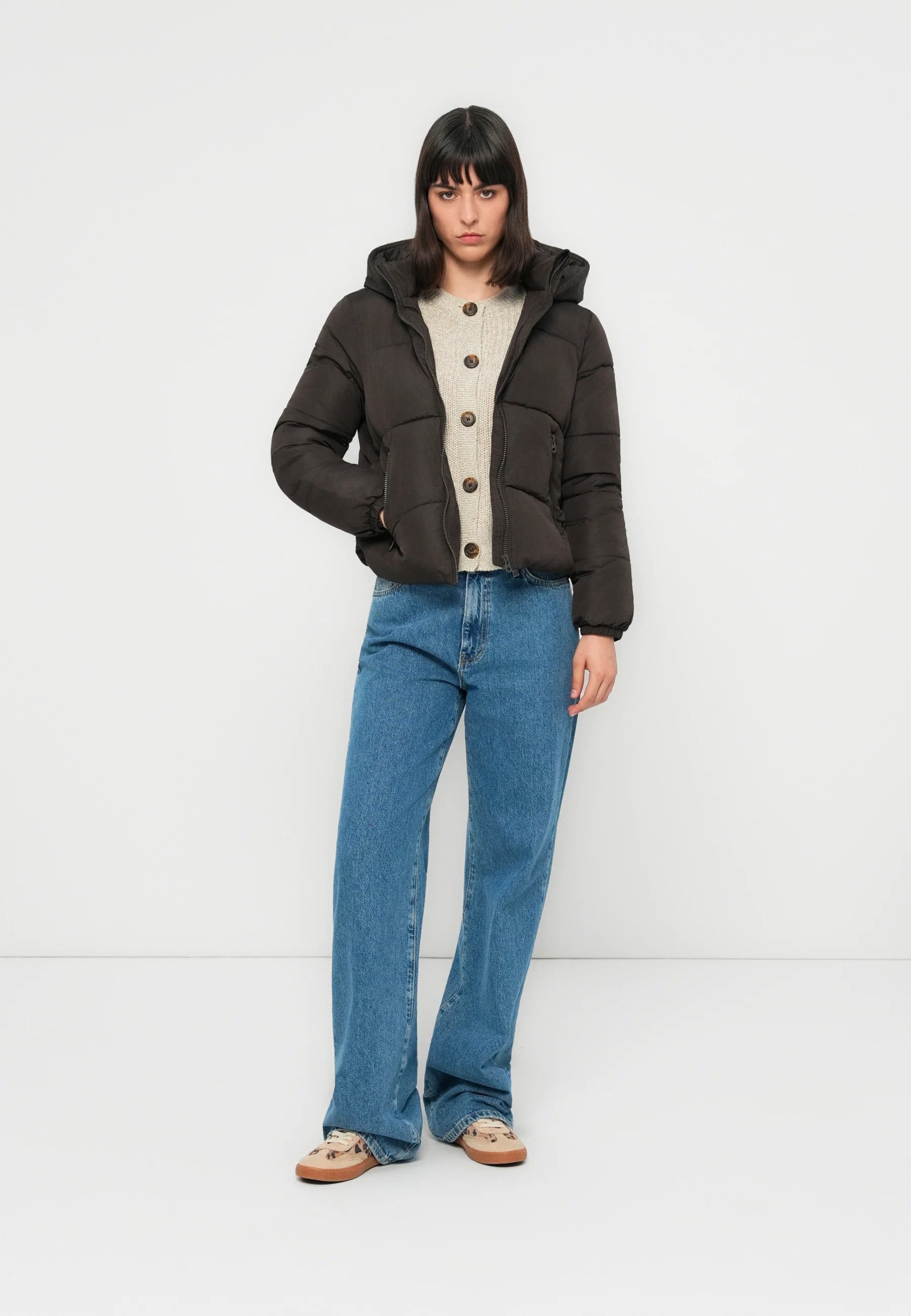 Black puffer jacket with hood and zip pockets