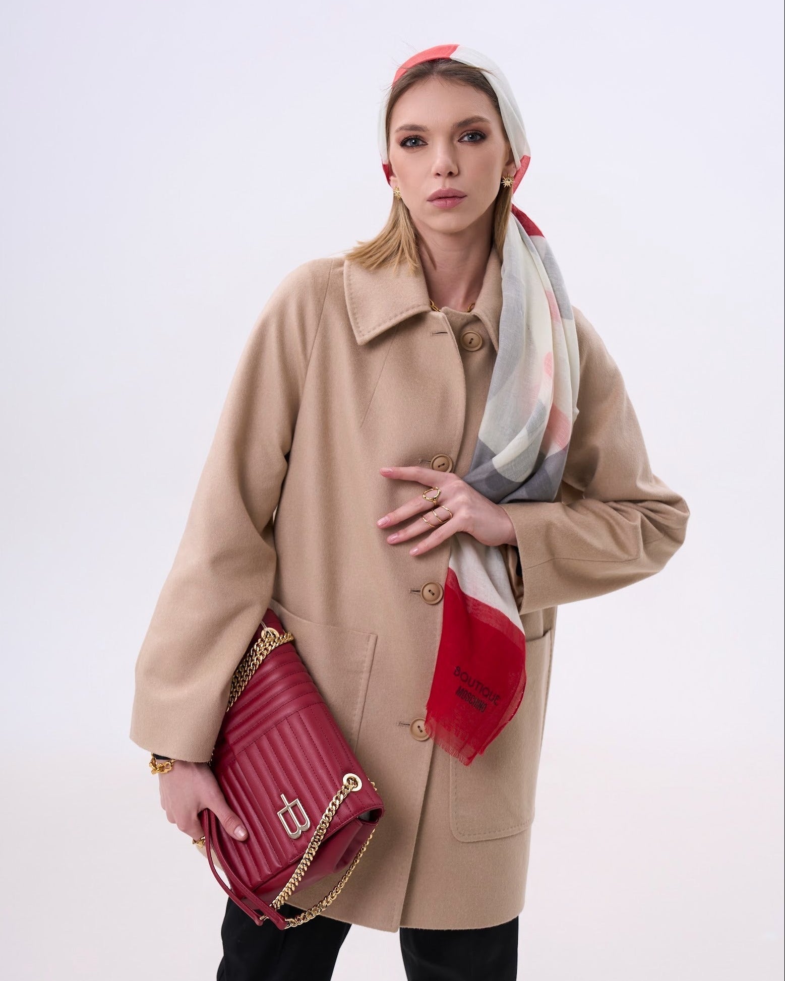 Beige coat with round collar and large pockets