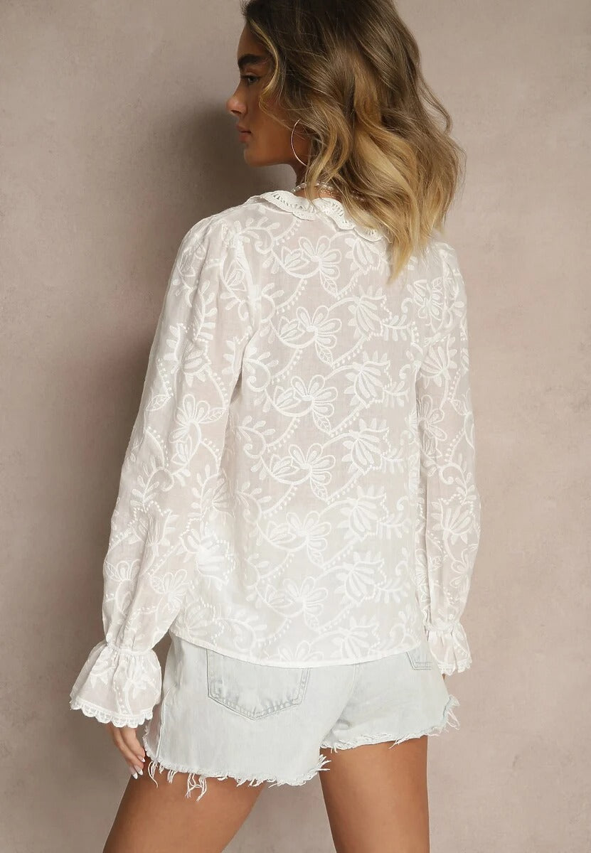 White embroidered blouse with ruffle trim at sleeves